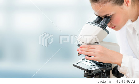 Scientist researcher uses microscope in laboratory 49494672