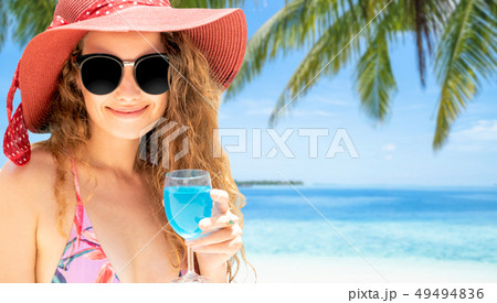 Happy young woman at beach in summer vacation. 49494836