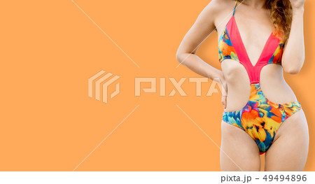 Woman in swimsuit posing on color background. Woman in swimsuit posing on color background. 49494896