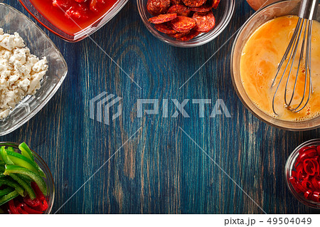 Ingredients for preparing frittata - eggs, sausage Ingredients for preparing frittata - eggs, sausage 49504049