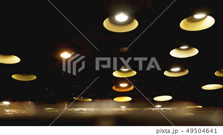 Spot lights in cinema hall on ceiling 49504641