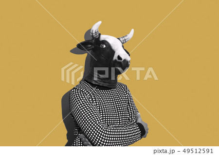 young man with a cow mask young man with a cow mask 49512591
