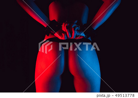 sexy erotic ass girl in a Thong with handcuffs 49513778