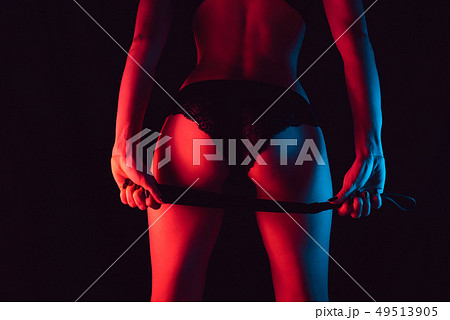 Sexy attractive girl ass with leather whip in lingerie Sexy attractive girl ass with leather whip in lingerie 49513905