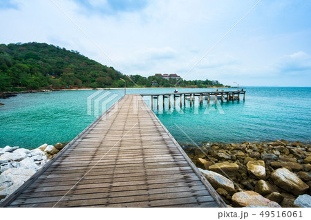 Wood bridge in to the sea Wood bridge in to the sea 49516061