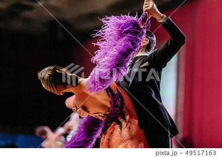 woman dancer with feather boa 49517163