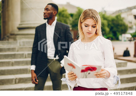 businesswoman with partner in a city 49517848