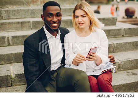 businesswoman with partner in a city 49517852