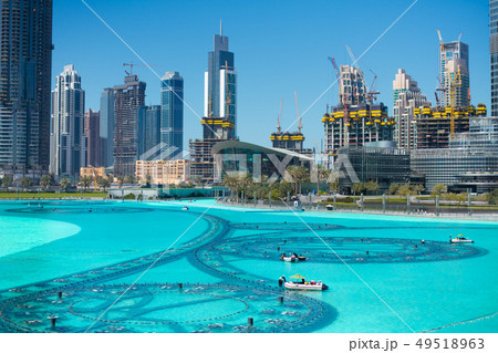 The Dubai fountain lake in the day The Dubai fountain lake in the day 49518963