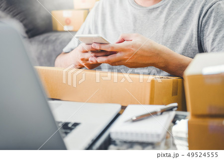 SME freelance man working with packaging startup SME freelance man working with packaging startup 49524555