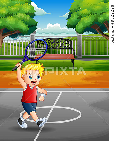 Happy boy playing tennis at the courts Happy boy playing tennis at the courts 49529298