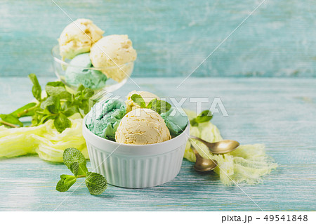Ice cream with mint in ceramic bowl 49541848
