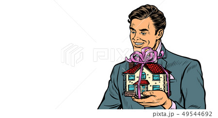 Businessman selling real estate, house as a gift isolate on white background 49544692