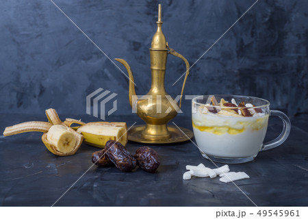 Iftar or Suhoor snack of dates with yogurt Iftar or Suhoor snack of dates with yogurt 49545961