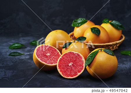 Grapefruits on a black background .Top view Grapefruits on a black background .Top view 49547042