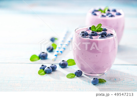 Healthy blueberry smoothie on rustic wooden Healthy blueberry smoothie on rustic wooden 49547213