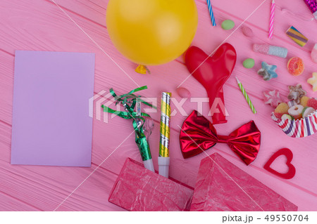 Birthday party accessories and blank paper card. Birthday party accessories and blank paper card. 49550704