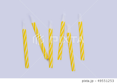 Yellow striped Birthday candles. Yellow striped Birthday candles. 49551253