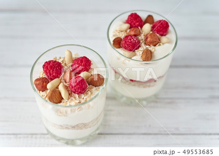 granola with raspberries, oatmeal flakes and nuts granola with raspberries, oatmeal flakes and nuts 49553685