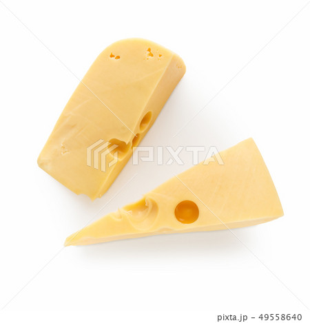 Pieces of cheese on white Pieces of cheese on white 49558640