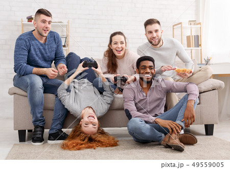 Home party. Friends playing video games online 49559005