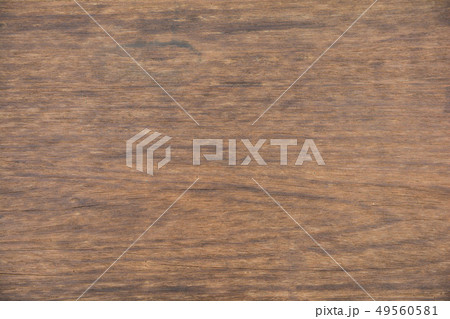 Dark textured wooden background. surface old brown Dark textured wooden background. surface old brown 49560581