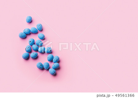 Blue decor easter eggs on pink background Blue decor easter eggs on pink background 49561366