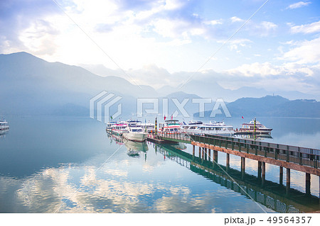 boat and speed boat pier in sunrise morning at Sun boat and speed boat pier in sunrise morning at Sun 49564357
