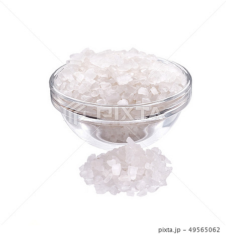 salt in a glass bowl isolated 49565062