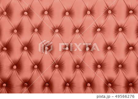 Pink capitone tufted fabric upholstery texture Pink capitone tufted fabric upholstery texture 49566276