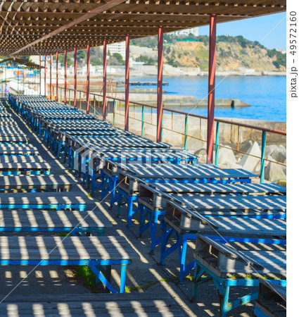 Old wooden deck-chair beach Crimea 49572160