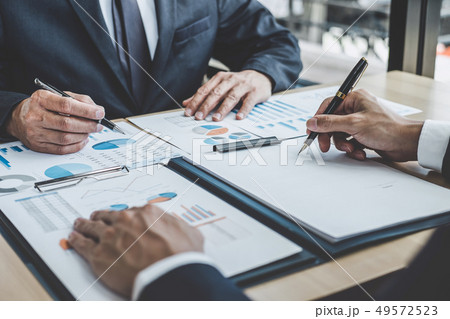 Two executive discussing company growth project success financia 49572523
