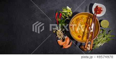 Top view composition of Tom kha gai soup. 49574970