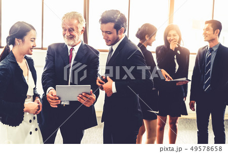 Many businessmen and businesswomen group meeting. 49578658