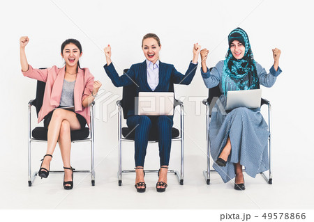 Happy young businesswomen celebrating success. 49578866