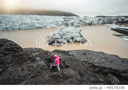 Traveler travel Svinafellsjokull Glacier, Iceland. 49579206