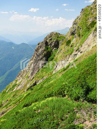 The rock on a high mountain slope. The rock on a high mountain slope. 49586020