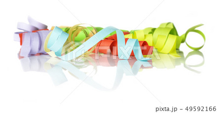 Multicolored streamers on a white background Multicolored streamers on a white background 49592166