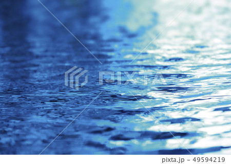 Water wave in swimming pool texture background 49594219