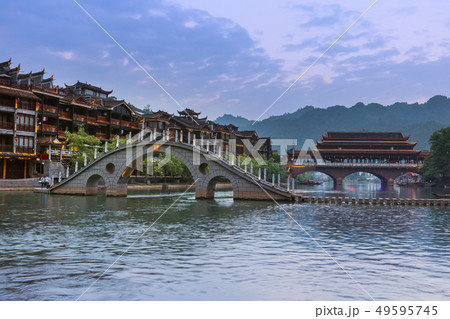 Ancient town Fenghuang at sunset in Hunan China 49595745