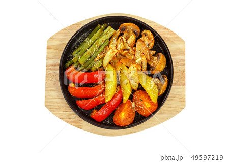 Vegetables grilled portion on pan white isolated 49597219