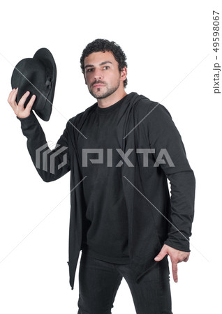 Man in black with his black hat 49598067
