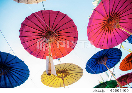 Umbrellas hanging on the sky. Umbrellas hanging on the sky. 49602400