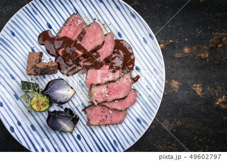 Barbecue wagyu aged fillet steak slices  49602797