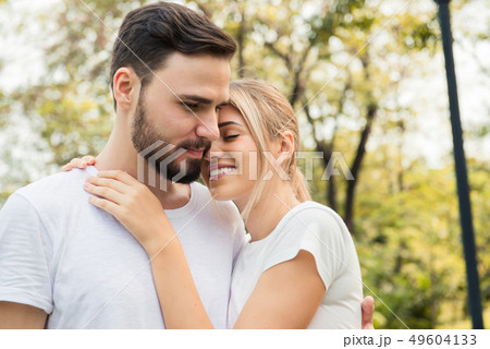 A couple happy and romancing at the park 49604133