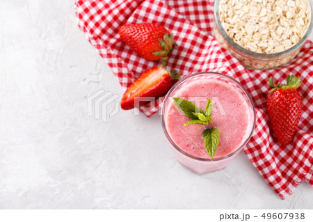 Strawberry milkshake or smoothie 49607938