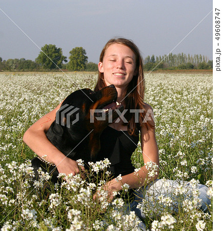teenager and rottweiler teenager and rottweiler 49608747