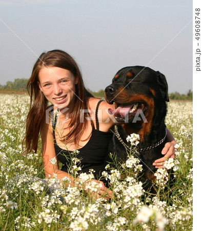 teenager and rottweiler teenager and rottweiler 49608748
