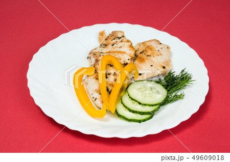 grilled chicken fillet on white plate grilled chicken fillet on white plate 49609018