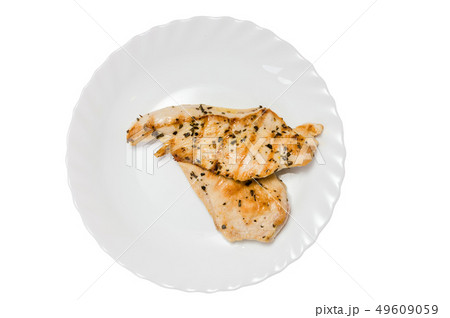 grilled chicken fillet on white plate 49609059